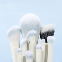 Kit de pinceaux de maquillage végétaliens professionnels ensemble de voyage de fond de teint de luxe avec sac bleu de marque privée pour le visage
