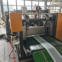 Machine de laminage et de revêtement entièrement automatique pour bande de butyl extrudé automobile