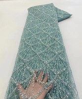 Tissu en dentelle brodée de sequins en gros pour robes de mariée et tenues de mariage