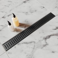 Drain de douche moderne en acier inoxydable pour salle de bain d'hôtel noir linéaire 24 pouces avec grille à motif de capsule amovible