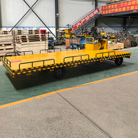 Chariot à plateau électrique robuste de 2 tonnes, plateforme de chargement 4x2m, 5m, 4 roues directionnelles, véhicule de transport industriel pour entrepôt