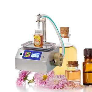 Machine de remplissage continue CNC économique et pratique pour le lait, le <span class=keywords><strong>vin</strong></span>, les solvants liquides, petite taille, prix en Afrique du <span class=keywords><strong>Sud</strong></span> - Product Image 1