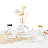 Conception créative 50ml 100ml 150ml 250ml bouteille de diffuseur de roseau en verre vide transparent facile à ouvrir extrémité rechargeable transporteur d'huile essentielle