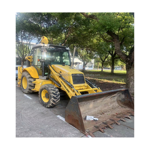 Retroexcavadora de segunda mano New Holland LB95B 95B LB95 con cucharón multifuncional - Product Image 6