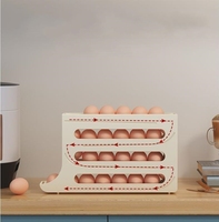 Accessoire de cuisine Boîte de rangement automatique d'œufs Porte-conteneur roulant pour réfrigérateur Organisateur d'œufs Distributeur de conteneurs