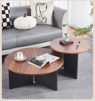 Table basse minimaliste de style américain moderne en bois massif en forme de fleur avec espace de rangement pour petits appartements et coins de salon