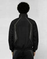 Ensemble de survêtement streetwear deux pièces en nylon froissé et polyester, comprenant une veste coupe-vent et un pantalon de jogging léger