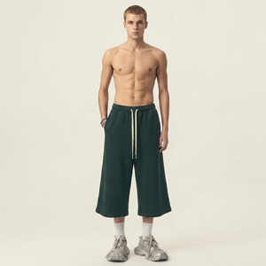 Shorts Capri Homme Vert Uni 100% Coton Taille Mi-Haute avec Cordon de Serrage Décontracté Tricoté Respirant Écologique Style Urbain - Product Image 1