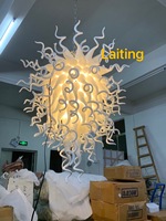 Éclairage lustre en verre soufflé jaune citron de maison moderne