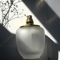 Vente en gros de flacons de parfum vides de luxe de 100 ml avec pulvérisateur à pompe, surface givrée, design élégant en verre