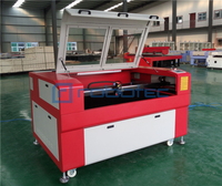 Machine de découpe/gravure laser CNC CO2 pour protection d'écran de téléphone portable/logo/étiquette/image à bas prix