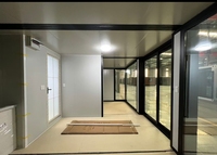 Maison conteneur pliable à double aile en structure acier sur mesure avec mur rideau en verre, module de salon de 20 pieds