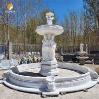 Fontaine d'eau européenne Décor de jardin extérieur Fontaine à flux laminaire en pierre personnalisée avec sculpture en marbre blanc pour hôtel
