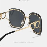 Lunettes de soleil de luxe pour femmes, monture métallique sans cadre, style Y2K2025, dégradé, lunettes en forme de cœur chromées