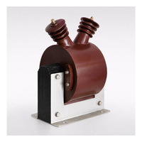 Les dispositifs de mesure et de protection utilisent un transformateur de tension JDZC-3/6/10 de 3-10 kV pour les applications de systèmes moyenne tension.