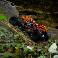 Axial RBX10 Ryft 1/10 4WD Brushless Rock Bouncer RTR 4S LiPo Buggy RC Tout-Terrain Haute Vitesse Orange AXI03005T2