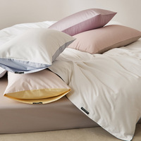 Parure de lit quatre pièces en coton longues fibres 100S, luxe léger, avec évacuation de l'humidité et stockage thermique, utilisation toutes saisons, couleur unie