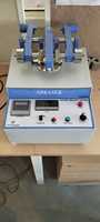 Testeur d'abrasion rotatif à double tête, machine d'essai d'abrasion avec compteur numérique de régime pour l'inspection des matériaux en laboratoire et les tests de résistance à l'usure