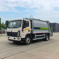 Camion compacteur de déchets Sinotruk HOWO 4x2, véhicule à énergie nouvelle, 10,5 m³, chargement arrière, pour la collecte des déchets