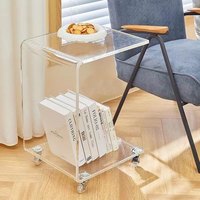 Table basse mobile multifonctionnelle pour la maison hôtel nouvelle mode en acrylique transparent à double niveau avec roulettes