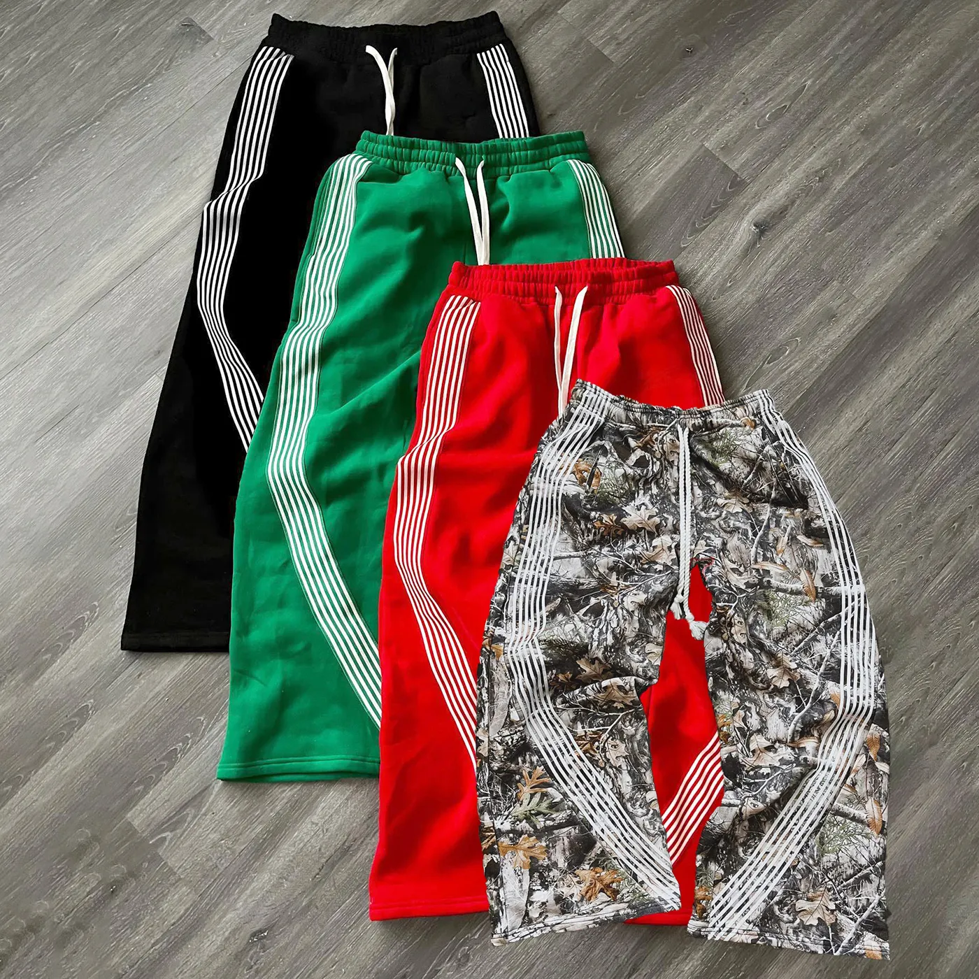 Custom streetwear de gran tamaño de camuflaje de ancho de pierna recta pantalones de chándal para hombre a rayas pantalones de chándal holgados para los hombres