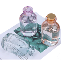 Vente en gros pot d'aromathérapie en rotin de luxe bouteille conteneur parfums liquides parfum de maison vide bâtonnets de roseau diffuseur bouteille en verre
