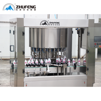 Machine de remplissage quantitative de contrôle de temps rotative automatique de prix usine pour le savon liquide facile à mousser de vinaigre de sauce de soja