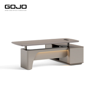 Bureau de direction moderne en L extensible de luxe en bois, réglable en hauteur, avec panneau design, fabriqué en usine OEM