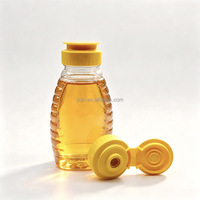 Vente en gros de bouteilles de miel en PET de 250 g avec valve anti-fuite