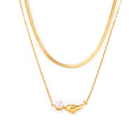 Collier tendance en acier inoxydable plaqué or 18 carats avec pendentif en forme de lune et perles imitation perle, avec chaîne à maillons pour femmes
