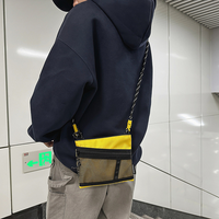 Nouveauté 2026 : Sac bandoulière style Harajuku pour femme et homme, design de niche, mini sac à main portable et tendance pour téléphone, en nylon imperméable