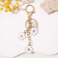 Porte-clés double face transfrontalier en cuir avec motif fleur de cerisier et lettre, breloque de sac pour étudiantes, pendentif en cuir Paperrecorder
