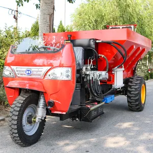 Land maschinen, Traktor montierte Obstgarten Graben Düngung Boden bedeckung maschine. Dünger streuer