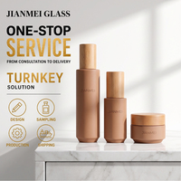 Ensemble de pots à crème pour le visage en verre kaki OEM ODM avec bouchon en bois naturel pour l'emballage cosmétique