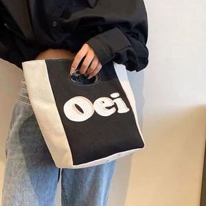 กระเป๋าคลัทช์ผ้าใบน่ารักดีไซน์เฉพาะสำหรับผู้หญิงกล่องอาหารกลางวันเดินทางแบบลำลองสไตล์แฟชั่น - Product Image 3