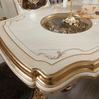 Table de salle à manger sculptée en bois massif de luxe européen meubles rétro personnalisés feuille d'or design traditionnel pour hôtel villa salle à manger