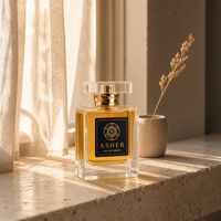 Flacon de parfum premium 50 ml carré en verre transparent vide avec collier doré, bouchon transparent, étiquette noire sérigraphiée et boîte