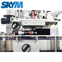 Machine d'étiquetage automatique à manchon rétractable SKYM pour bouteilles d'eau minérale et de boissons