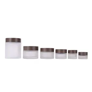 Bán Buôn Chất Lượng Tốt Ưa Thích Vòng 5G 10G 15G 20G 30G 50G 100G Frosted Glass Mỹ Phẩm Kem Jar Với Màu Xám Đen Hạt Gỗ Nắp