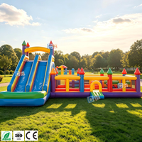 Aire de jeux gonflable géante commerciale avec toboggan et château gonflable pour la location d'événements d'été en plein air