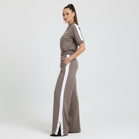 Ensemble de survêtement pour femme à manches courtes, veste courte zippée, pantalon de survêtement à jambes larges avec rayures latérales et boutons-pression, vente en gros