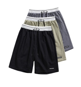 2024 nuevos pantalones cortos deportivos de secado rápido de estilo fino de verano de seda de hielo pantalones cortos casuales rectos sueltos - Product Image 1