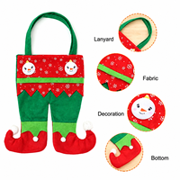 Sacs cadeaux de Noël en forme de jambes d'elfe mignonnes pour contenir des bonbons et de petits cadeaux pour la décoration de l'arbre de Noël et du foyer