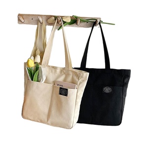 Sac fourre-tout en toile multifonctionnel avec logo personnalisé, grandes poches extérieures, idéal pour les sorties universitaires et le shopping du week-end, avec poche intérieure - Product Image 1
