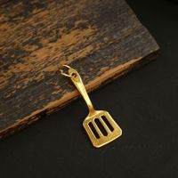 LOL Cloud Top Yi Pendentif de combat et porte-clés en alliage, motif pelle dorée et pot d'or, pour sac à dos, cadeau
