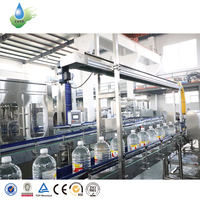 Machine de remplissage automatique de bouteilles d'eau et de boissons de grande capacité 3L 5L 10L 15L Ligne de production d'eau potable pure et minérale Pompe Moteur
