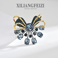 XILIANGFEIZI Nouvelle Broche Papillon Élégante et Haut de Gamme en Ruban Doré avec Cristaux Autrichiens et Accessoires Bleu Foncé Raffinés