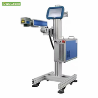 Machine de marquage laser à fibre CO2 haute stabilité pour ligne de production, machine de marquage laser volante intelligente et automatique de bureau 220V