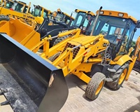 Machines de construction d'occasion chargeuse sur pneus JCB 3CX 4CX mini tracteur 7 tonnes chargeuse-pelleteuse d'occasion originale JCB 3CX pelleteuse
