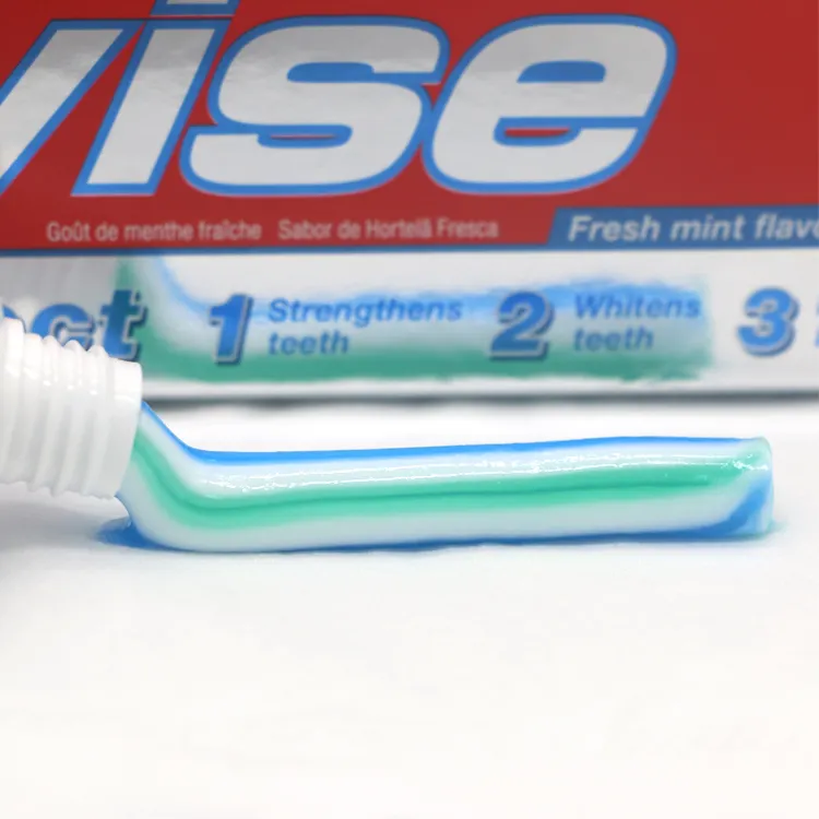 3 रंग टूथपेस्ट फैक्टरी मूल्य 100g Oralwise दांत Whitening Anticavity फ्लोराइड टूथपेस्ट थोक